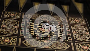 Board game of backgammon, bones on the board