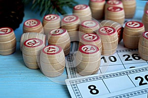 Board game lotto with cards and wooden kegs