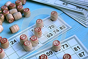 Board game lotto with cards and wooden kegs