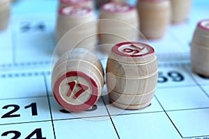 Board game lotto with cards and wooden kegs