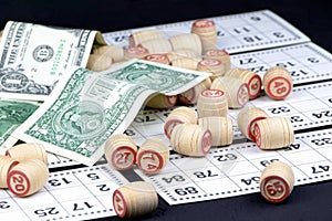 Board game lotto with wooden barrels. Lotto cards. Bingo games. Gambling