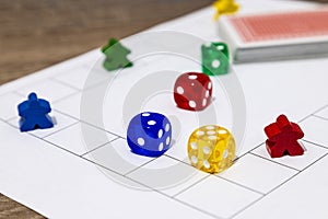 Board Game Pieces and Dice on Playfield