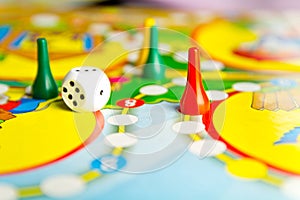 Board games for the home. Yellow, green and red plastic chips an