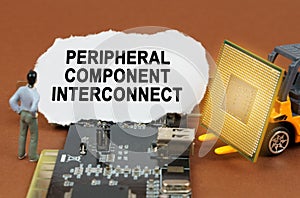 On the board with microcircuits lies a paper plate with the inscription - Peripheral Component Interconnect