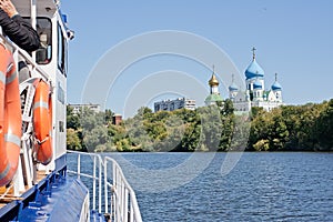 Board of the motor ship and the Nicolo-Perervensky monastery in Moscow (Russia).