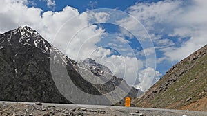 Board sign with snow mountain range in northern of  India