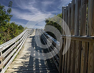 a board walk on the coast of new england