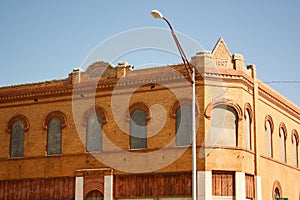 Boarded Up Brick Building in Hollis Oklahoma photo
