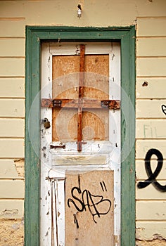 Boarded up door