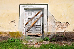 Boarded up entrance photo