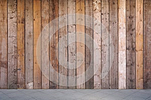 Boarded up wall with weathered wooden planks