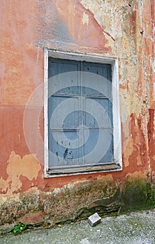 Boarded up window in an building