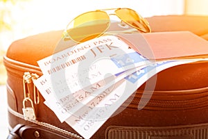 Boarding pass tickets and luggage