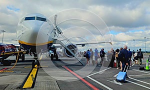 Boarding  the plane on the tarmack