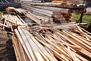 Boards and logs in a sawmill