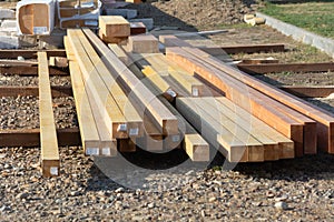 Boards are stacked on the street near Tighina fortress construction site at November 2022. A wood material on the building site