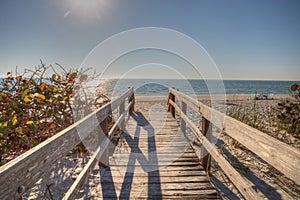 Boardwalk across the white sand beach of Delnor-Wiggins Pass Sta