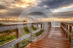 Boardwalk Leading to the Beach at Sunrise