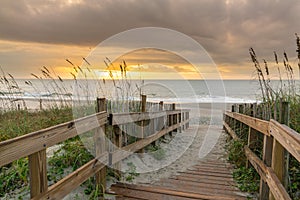 Boardwalk Leading to the Beach at Sunrise