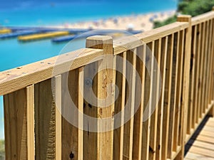 Boardwalk next to a beach photo