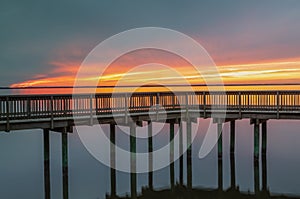 Boardwalk Silhouette Against Sunset Sky NC