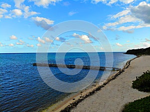 Boardwalk stretching into the sea Cayman Islands