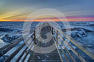 Boardwalk sunset at Grey`s Beach Cape Cod