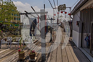 Boardwalks stretch seaward on the clan jetties in George Town, Penang Island, Malaysia, Asia