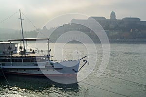 Boat against Royal palace in Budapest