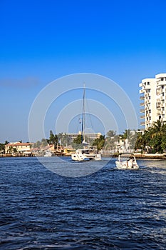 Boat along Hillsboro Inlet Waterway headed to Hillsboro Beach