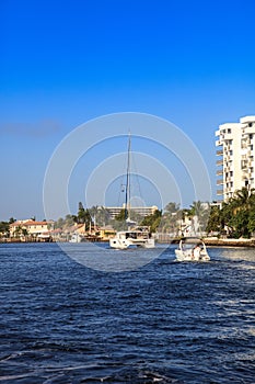 Boat along Hillsboro Inlet Waterway headed to Hillsboro Beach