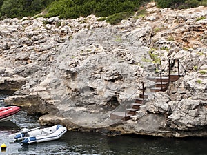 Boat anchor in a small bay in Menorca.