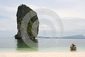 Boat anchored on the beach