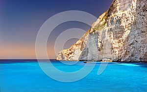 Boat anchored on Navagio beach (also known as shipwreck beach), Zakynthos island, Greece