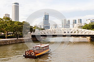 Boat Approaching Anderson Bridge on Singapore River