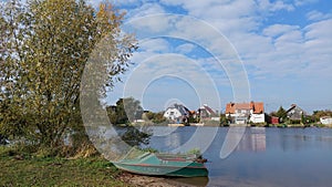 Boat on the bank of the Matrosovka River in the village of Matrosovo, Kaliningrad Region