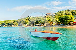 Boat at the bay with turquoise water, Mayreau island Saint Vincent and the Grenadines