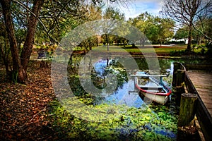 Boat on bayou of Vermillonville historical village