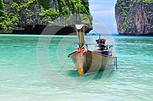 Boat on the beach at Koh phi phi island Phuket, Thailand photo