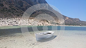 Boat on beach near Gramvousa Island in Crete