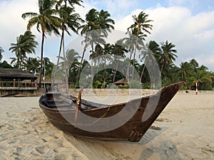 Boat on the beach in Ngwe Saung, Myanmar photo