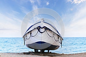 Boat on the beach at sunrise time