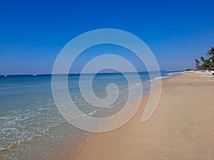 boat on the beach, tropical beach, clean water and blue sky Goa beach, Indian ocean beach. fishing boat in beach.