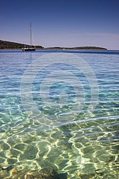 Boat in beautiful crystal clear sea