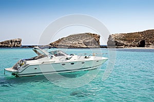 Boat on blue lagoon