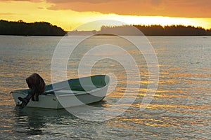 Boat in Boca Chica bay at sunset