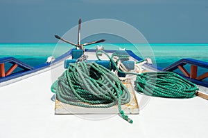 Boat bollard detail on blue water background