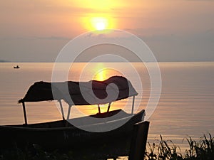 Boat at the border of the lake photo