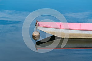 Boat bow isolated in blue water