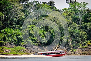 Boat bus in Leticia, Amazonas river, Colombia, America photo